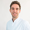 Dr. L. van Hout